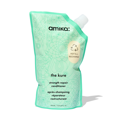 the kure strength repair conditioner forever friend bottle + pouch duo